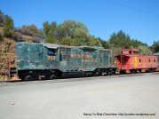 Western Pacific locomotive & red caboose