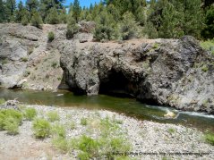 shallow cave along river